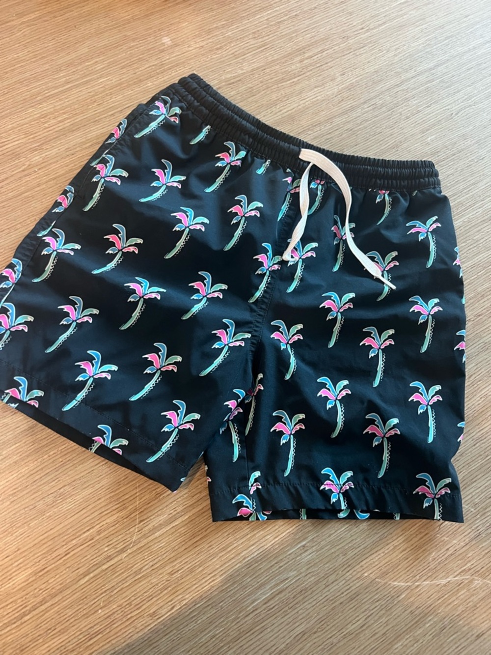 chubbies Black Swim Trunks with Light Blue Logo Tag
